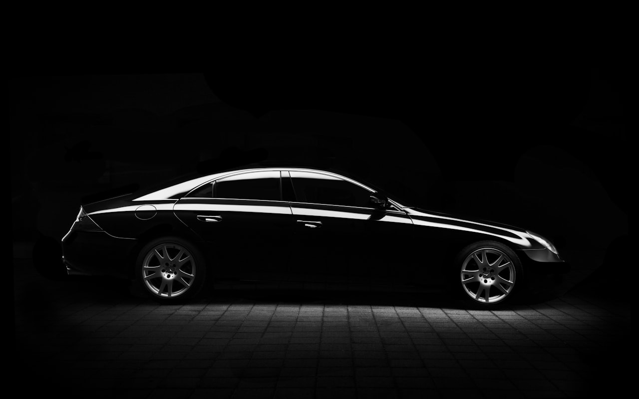 Black executive sedan from the PHXSUV fleet